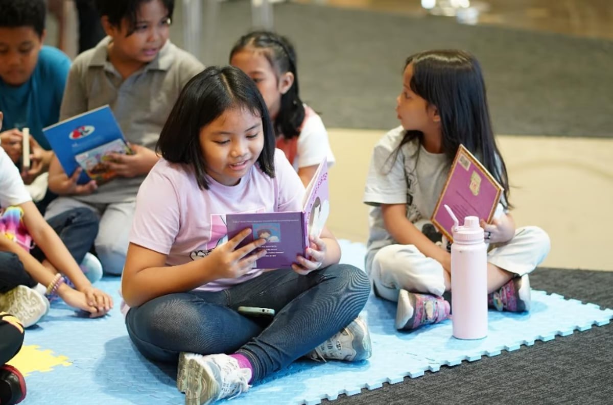 A young reader participates in Book Nook's free literacy events